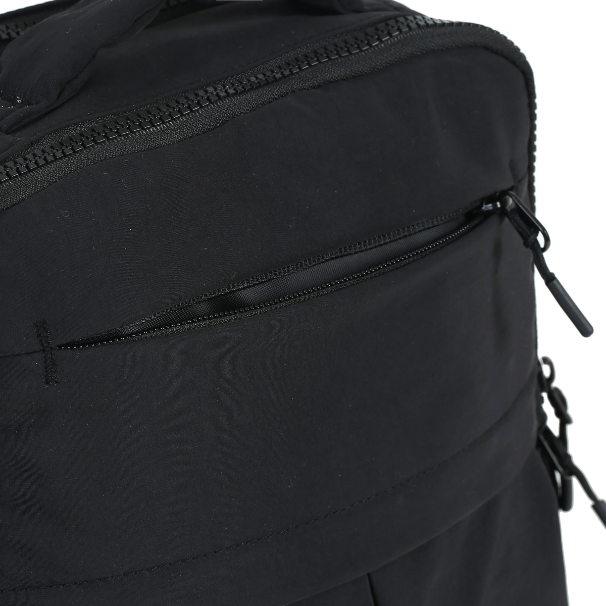 Minimax - The Roomiest Mini Backpack